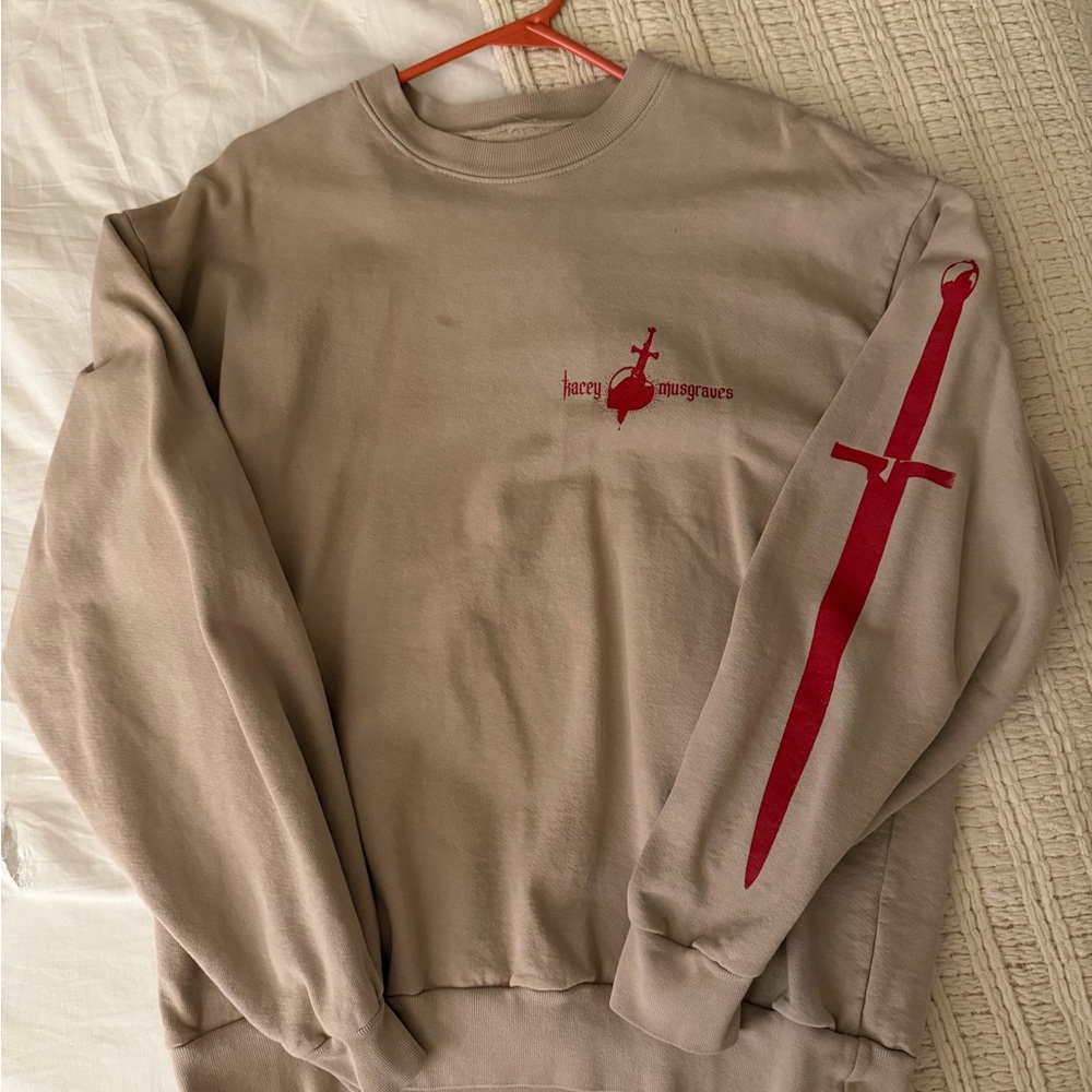 Kacey Musgraves Tan Sweatshirt with Red Sword Design